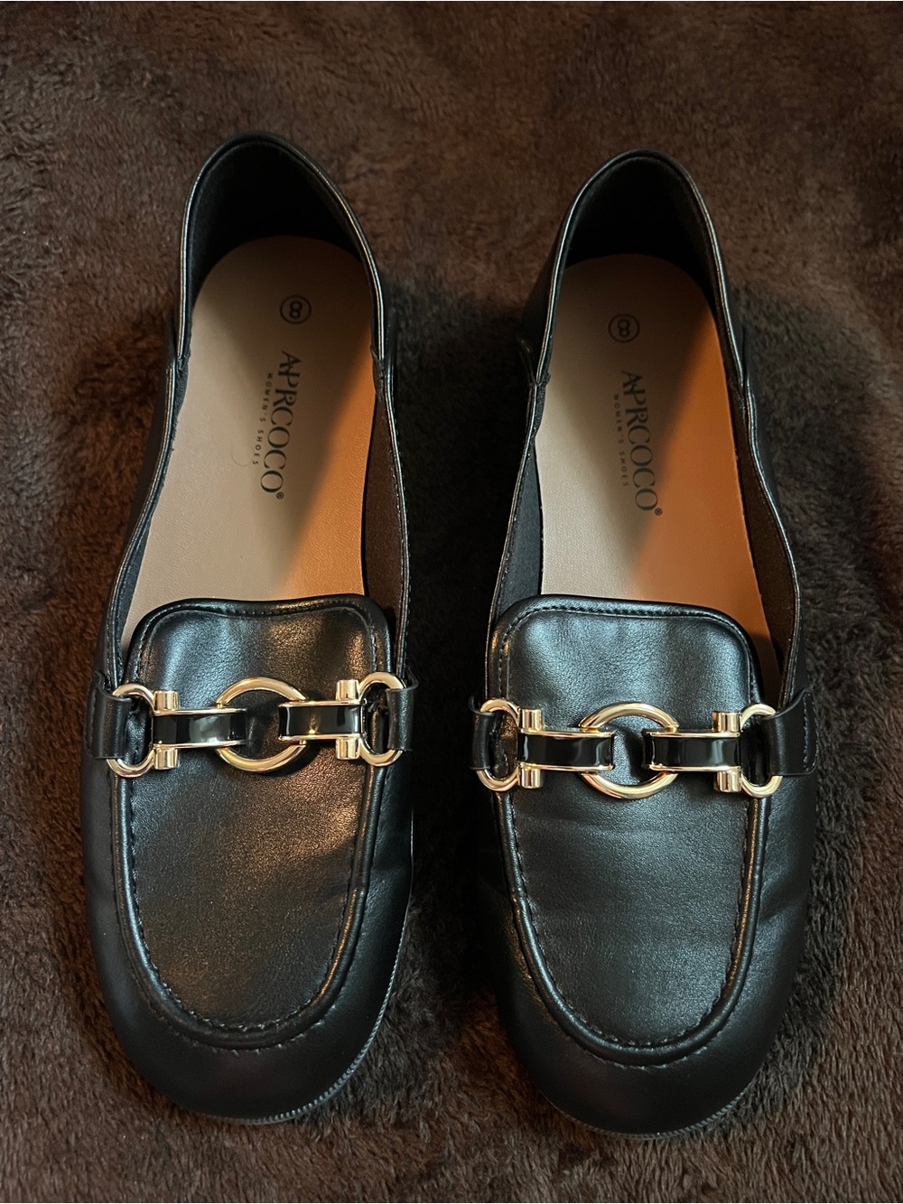 AprCoco Black Leather Loafers with Gold Chain Accent
